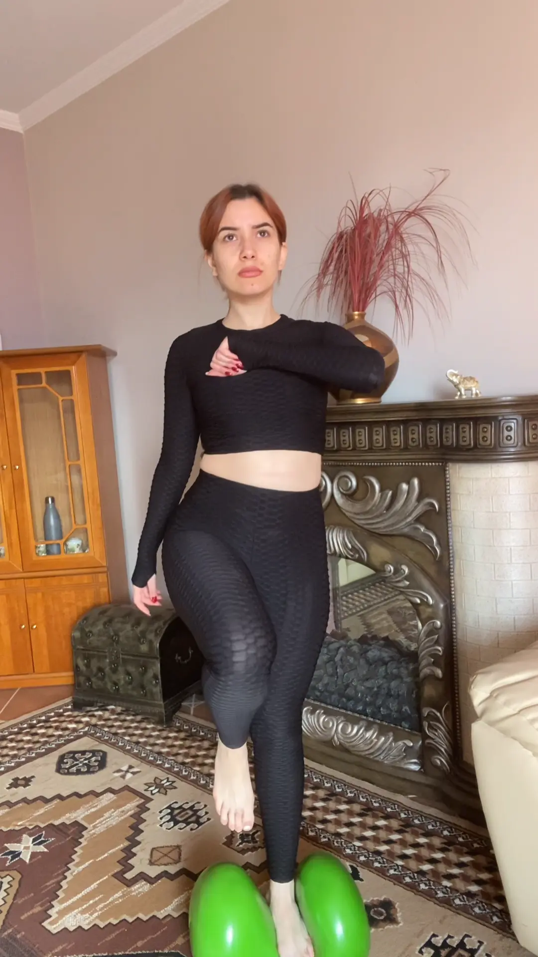 Lady using Air8 for foot exercises at home