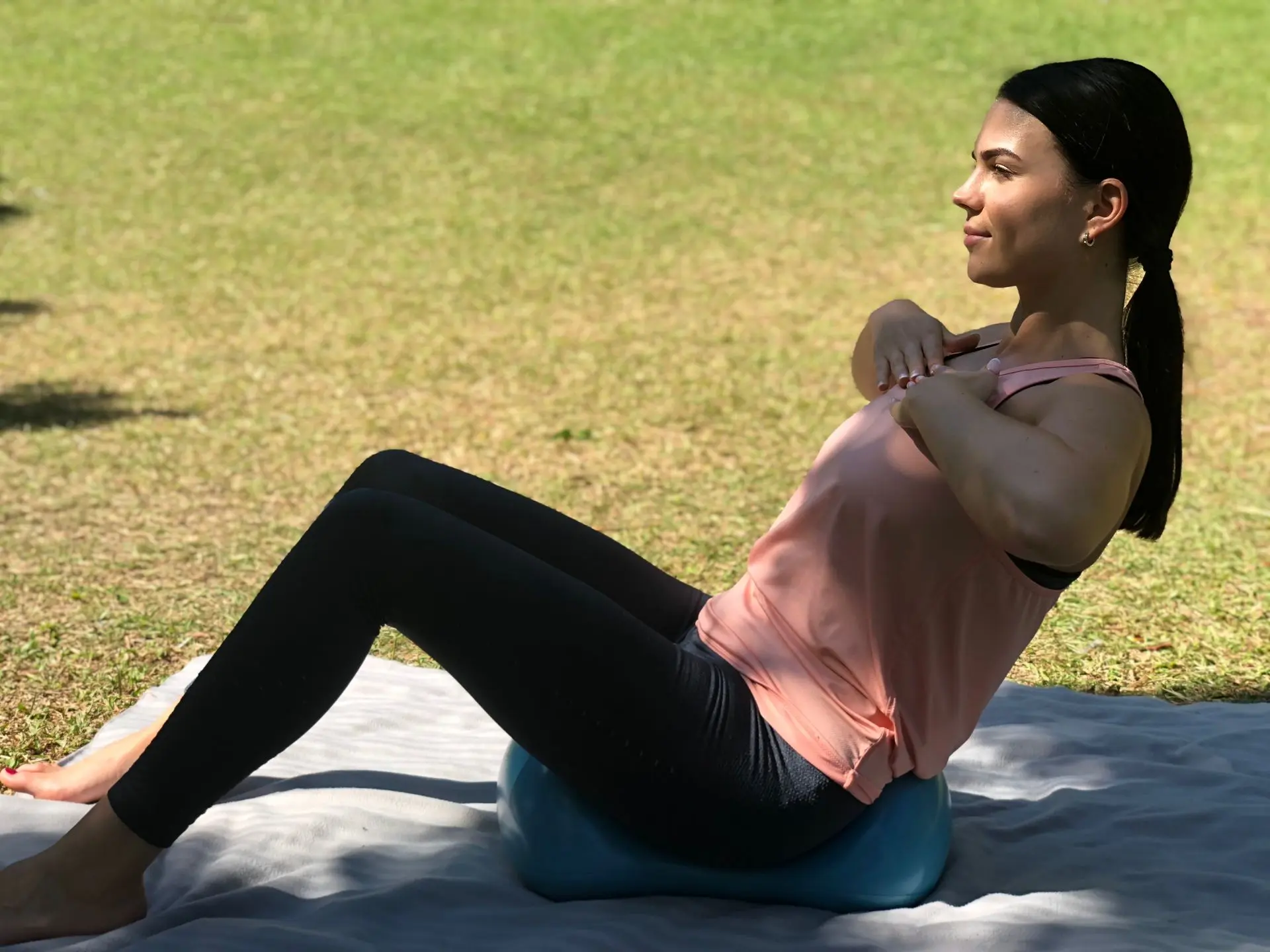 Woman doing fitness training on the Air8 in the park