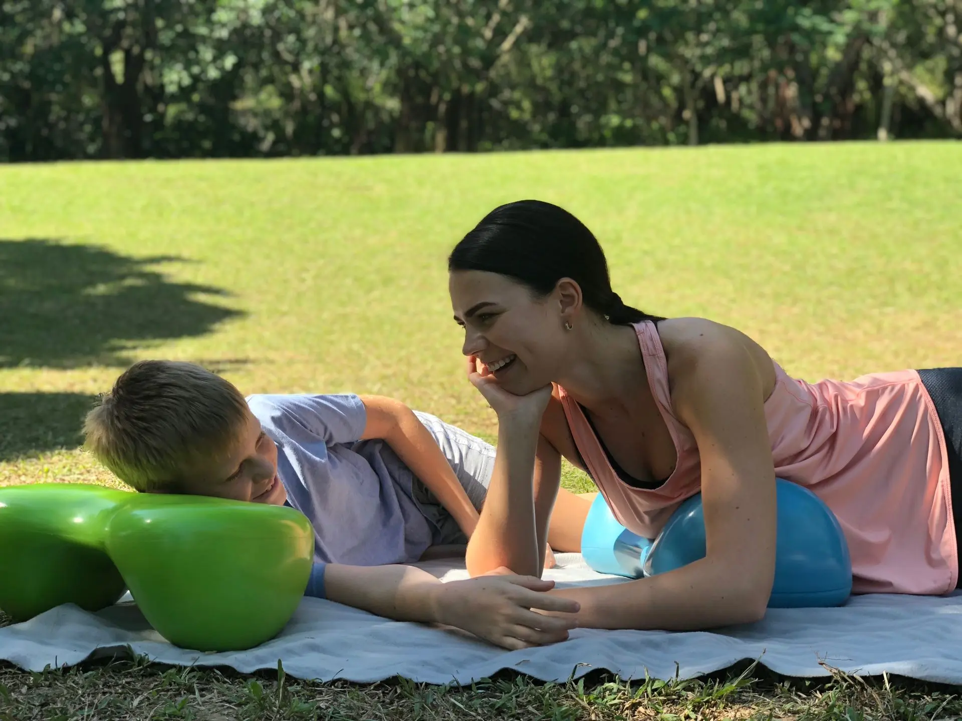 Mother and son having a picnic in the park on Air8