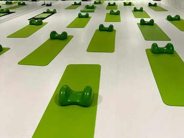 A fitness studio full of green Air8 Cushions